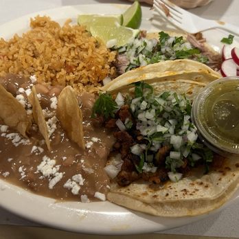 Mi Casa Mexican Restaurant signature dishes Carnitas TacoChilaquilesAl Pastor Burrito